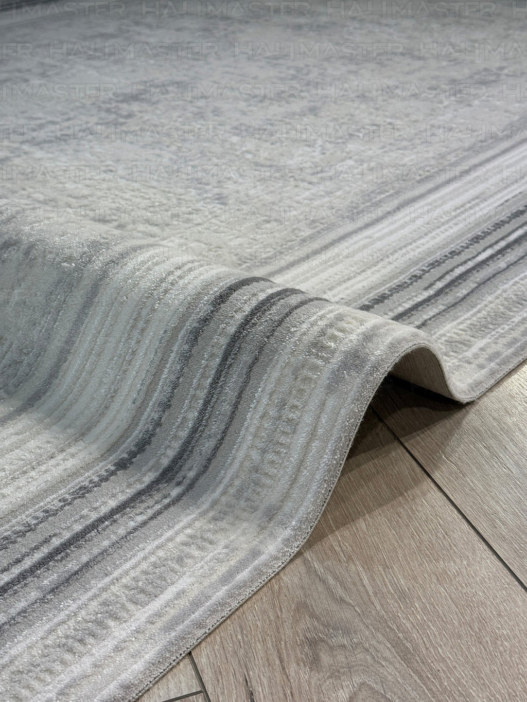 Kumru Minimalist Çizgili Bordürlü Eskitme Görünümlü Gri Kesme Halı