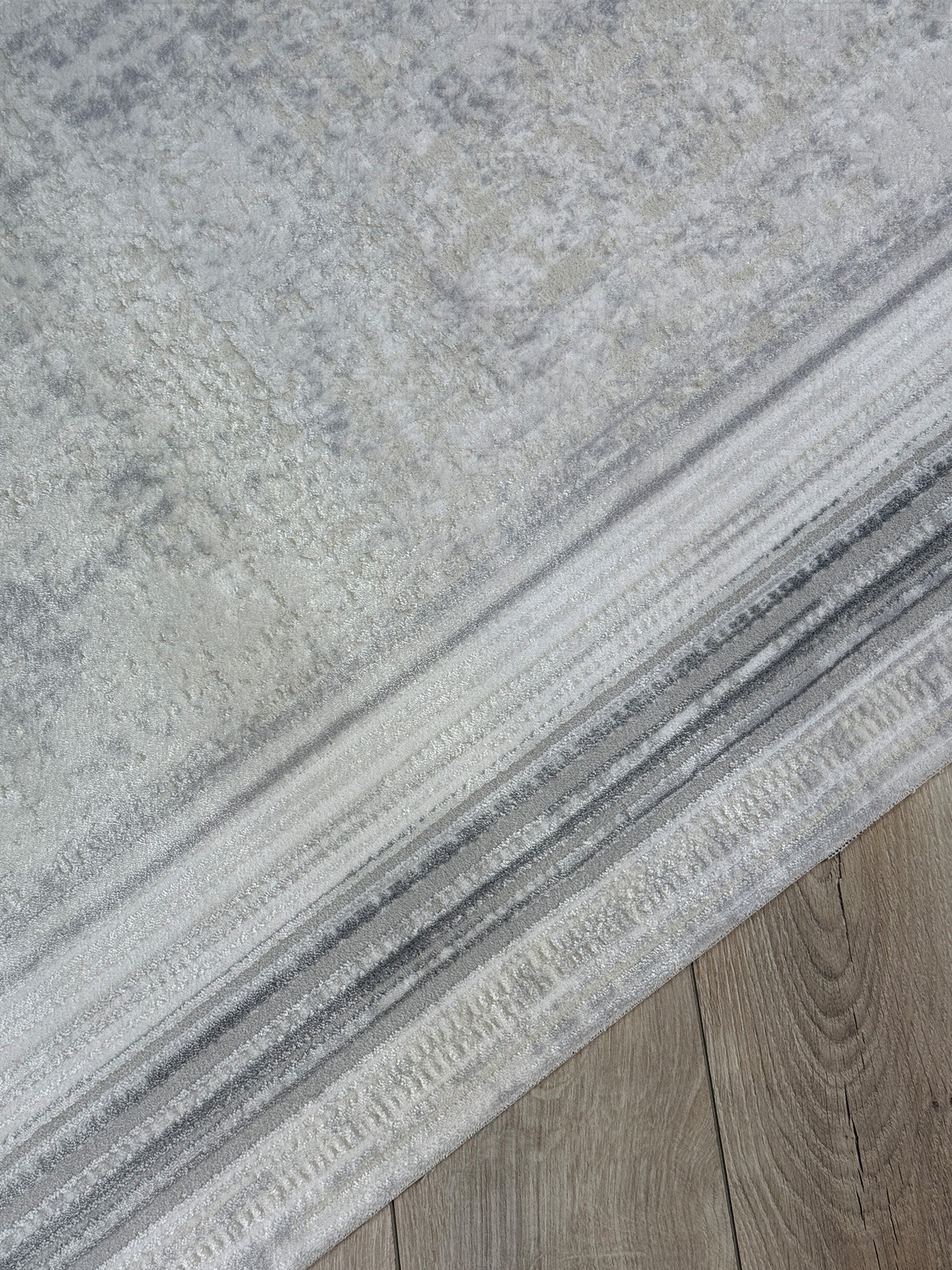 Kumru Minimalist Çizgili Bordürlü Eskitme Görünümlü Gri Kesme Halı